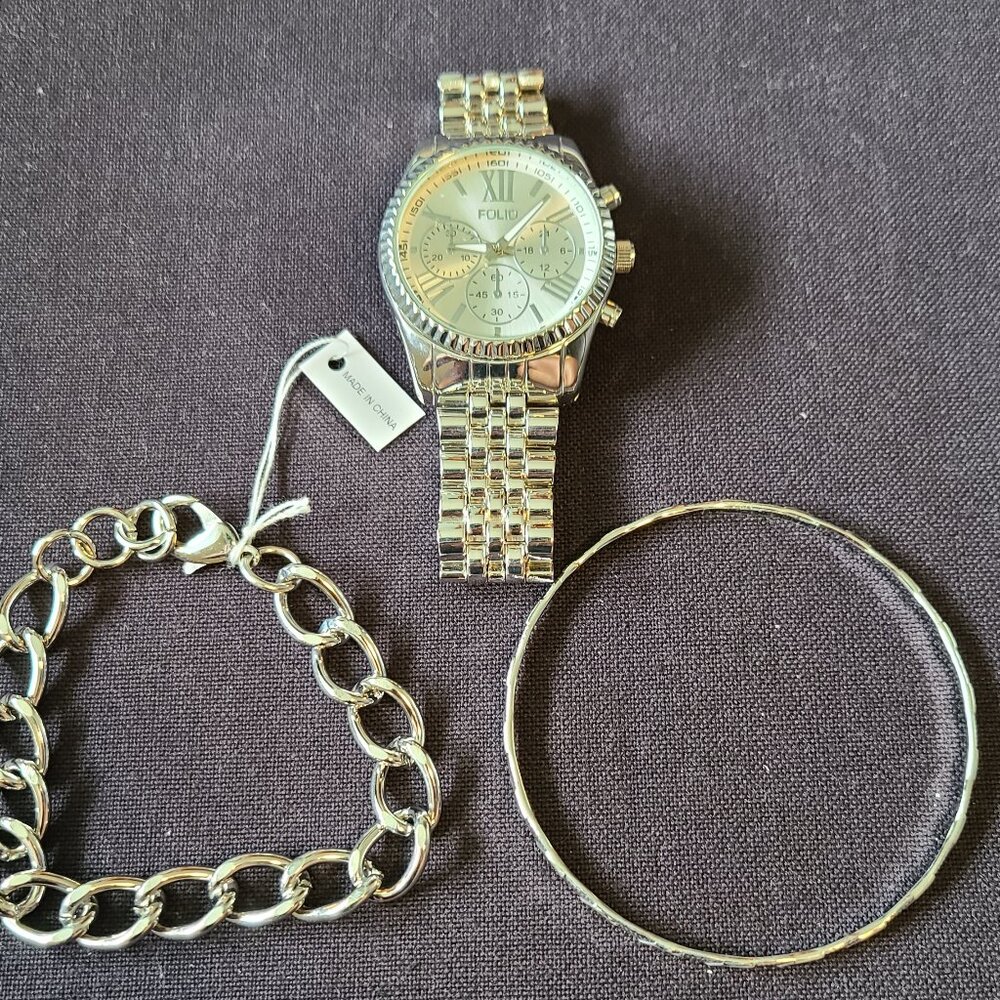 Never Worn Stainless Steel Folio Men's Watch and Bracelet set.
